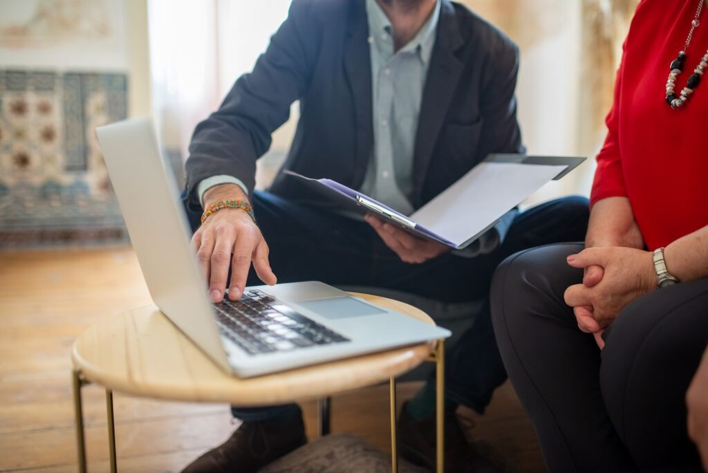 Recruiter discussing documents with candidate
